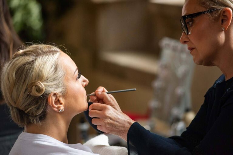 A bride gets ready for her wedding at Bilsington Priory