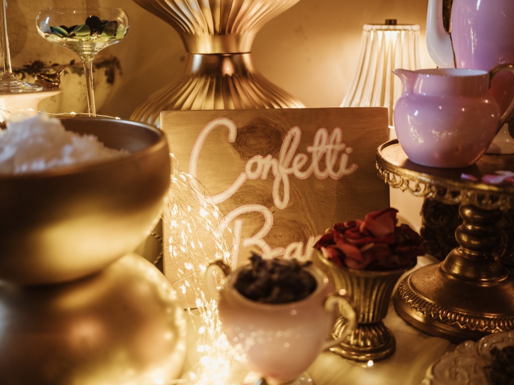 A confetti bar located in the Priory Lobby with a sign reading Confetti Bar