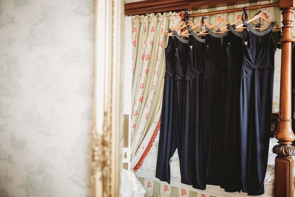 The Bridesmaids Dresses hung up in the Edwardian Manor House at Bilsington Priory