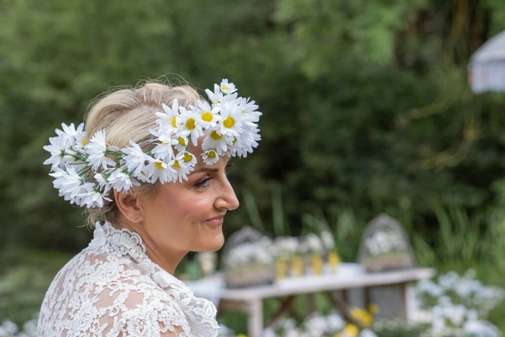 A bride with a daisy crown on the Bilsington Estate near Ashford