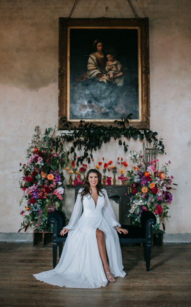 A bride sat in Great Hall of the Bilsington Priory