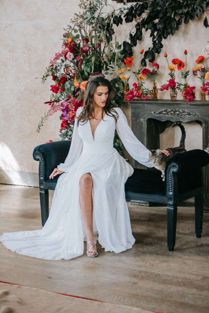 A bride sat in Great Hall of the Bilsington Priory
