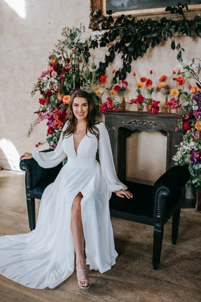 A bride sat in Great Hall of the Bilsington Priory